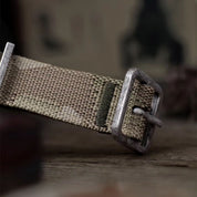 RSM's jacquard-woven camouflage watch band features 5 colors in its IRR camo design, with distressed silver hardware and Mr Walrus silhouette. Photo by Timex.VintageMX