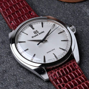 Burgundy red lizard watch strap from RSM Watch strap is placed on the Grand Seiko SBGY limited edition with white fluted dial. The burdundy lizard has vertical pattern has different tones of red and burgundy from the process of the dying methods.