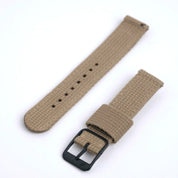 The Vintage Military 2-Piece (Steel) beige fabric strap with quick-release spring bars and a black metal buckle, displayed on a white background.