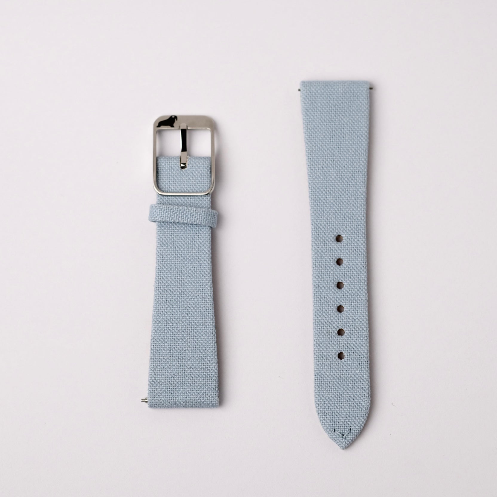 This Light Blue Fine Canvas watch strap from RSM showcases beautiful texture from a Japanese manufacturer, featuring a V stitch for a sleek, timeless look.