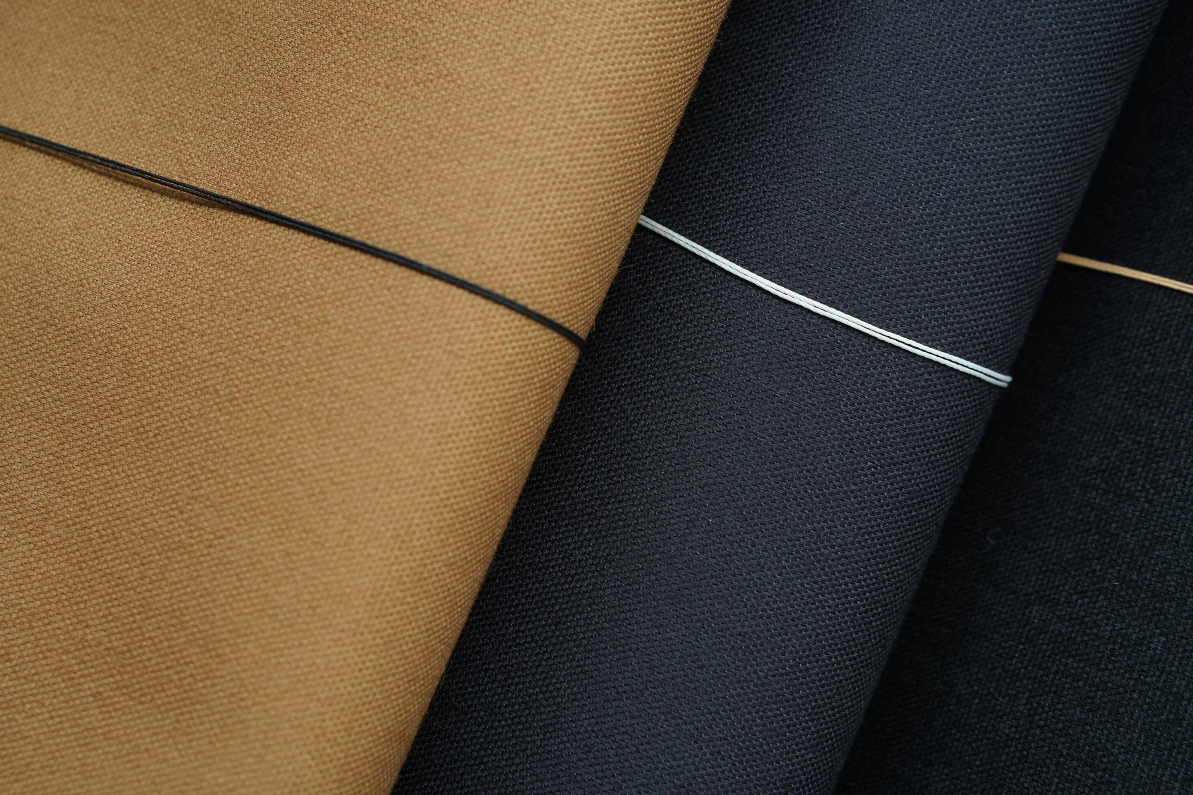 Tightly woven Japanese canvas used in RSM watch strap Fine canvas series. Beautifully matched linen threads are used in accent stitches on the watch straps.