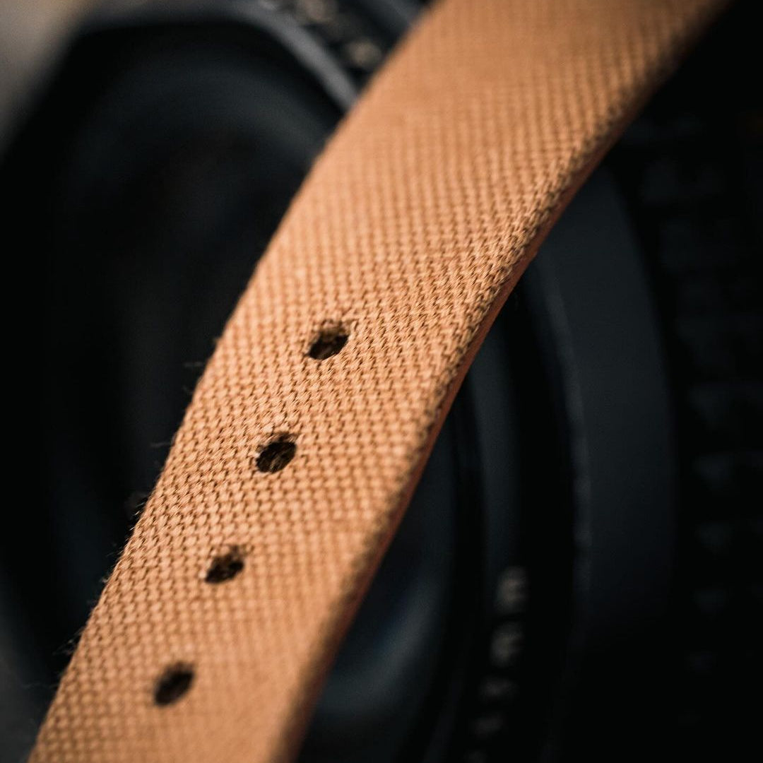 RSM Watch Strap detail showing fine canvas woven tightly, with neat holes and signs of wear from regular buckle positioning.