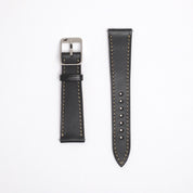 RSM's Raven Black Buttero leather watch strap with a slight sheen showcases high-quality leather, contrasting beige stitching, clean punched holes, and a 316L stainless steel buckle.