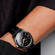 Seiko Sarb033, a classic watch now out of production, is worn with RSM's Stealth black engraved strap on the wrist.