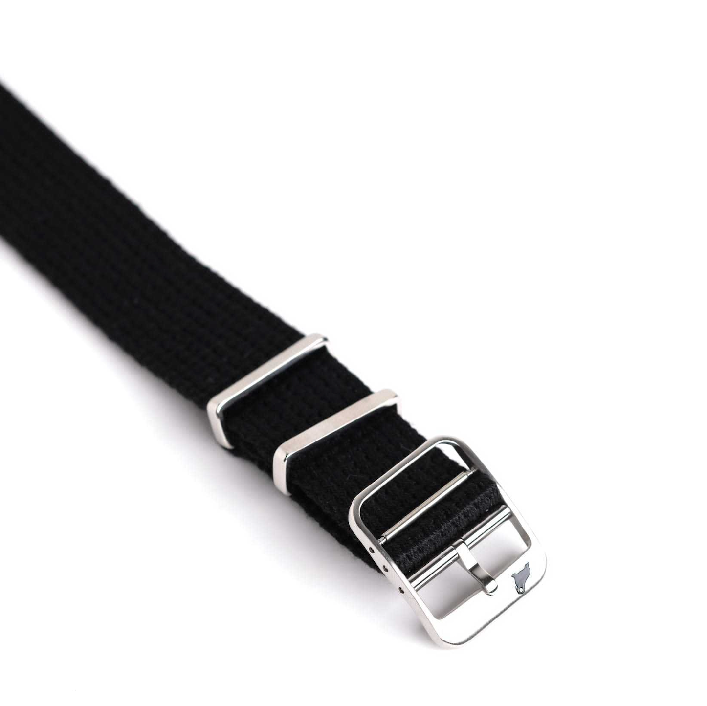 The Quickstart VTG Mil (Black) watch strap features a black fabric design with a polished stainless steel buckle and two metallic loops, showcased flat against a white background to highlight its texture and minimalist style.